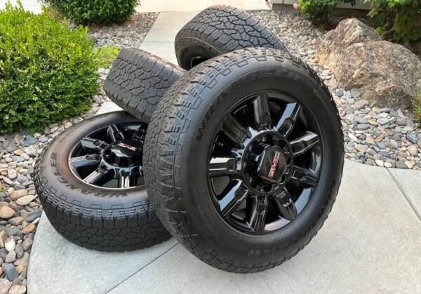 2024–2027 GMC Sierra 3500HD AT4 20” Carbon Gray Machined Wheels & Goodyear Wrangler Territ