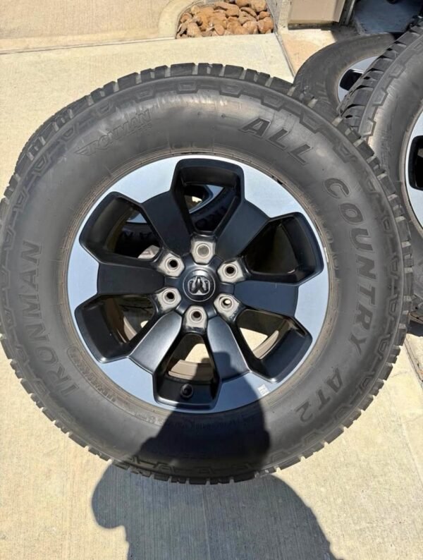 4 Ram Rebel OEM Rims & Tires – 275/70R18 – Complete Set