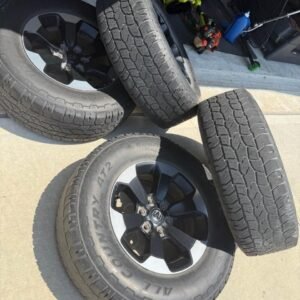 4 Ram Rebel OEM Rims & Tires – 275/70R18 – Complete Set