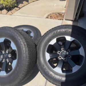 4 Ram Rebel OEM Rims & Tires – 275/70R18 – Complete Set