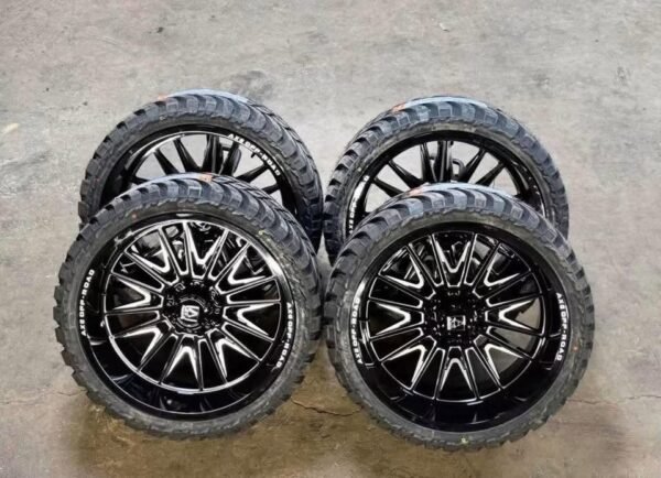 24x12 AXE WHEELS + 33x13.50R24 AMP R/T TIRES — 8x170