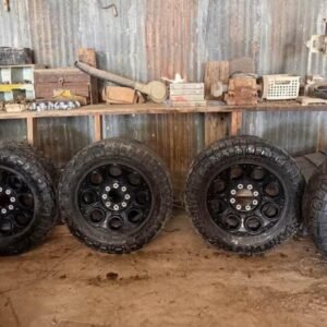 2023+ Ford F-250 OEM Wheels + 35” Nitto Ridge Grapplers — 8x170